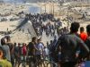 Warga Gaza berkumpul di Nuseirat, Jalur Gaza tengah, pada 10 Oktober 2025.